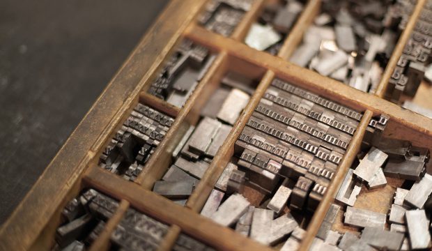 Close-up of metal letterpress letters in printing machinecolor image, canon 5DmkII